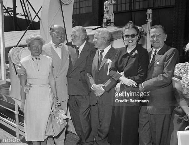 Mrs. Hemingway, George W. Brown, Ernest Hemingway, Spencer Tracy, Mrs. Leland Hayward, and Leland Hayward are shown here at the ship S.S. Flandre, as...