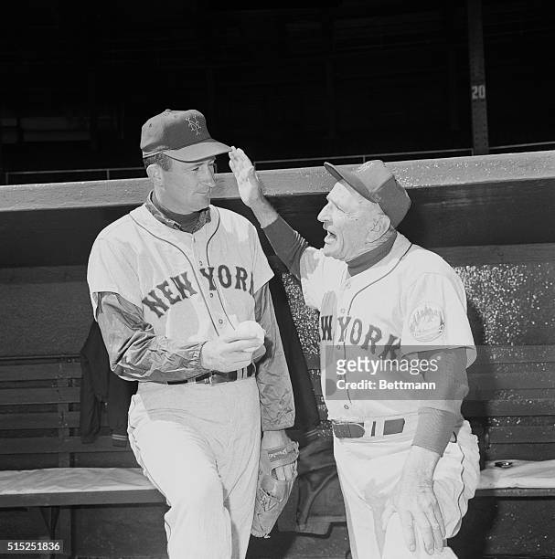 Manhattan, New York, New York: The Ol' Perfessor [sic] has a pregame pep talk with Roger Craig, who starts for the Mets today in their opener against...