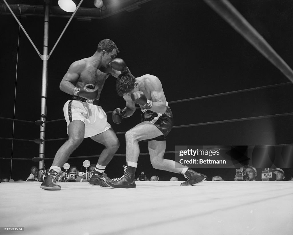 Roland LaStarza Receives A Blow To The Head From Rocky Marciano News roland-lastarza-receives-a-blow-to-the-head-from-rocky-marciano-news