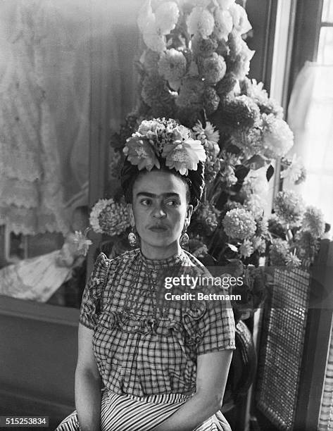 Frida Kahlo, Mexican painter, and wife of Diego Rivera is shown in this photograph.