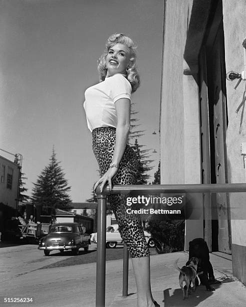 The state of Texas can now boast of 100 girls who have landed Hollywood Studio contracts. Attractive Jayne Mansfield, who measures 10-22-35 1/2, is...