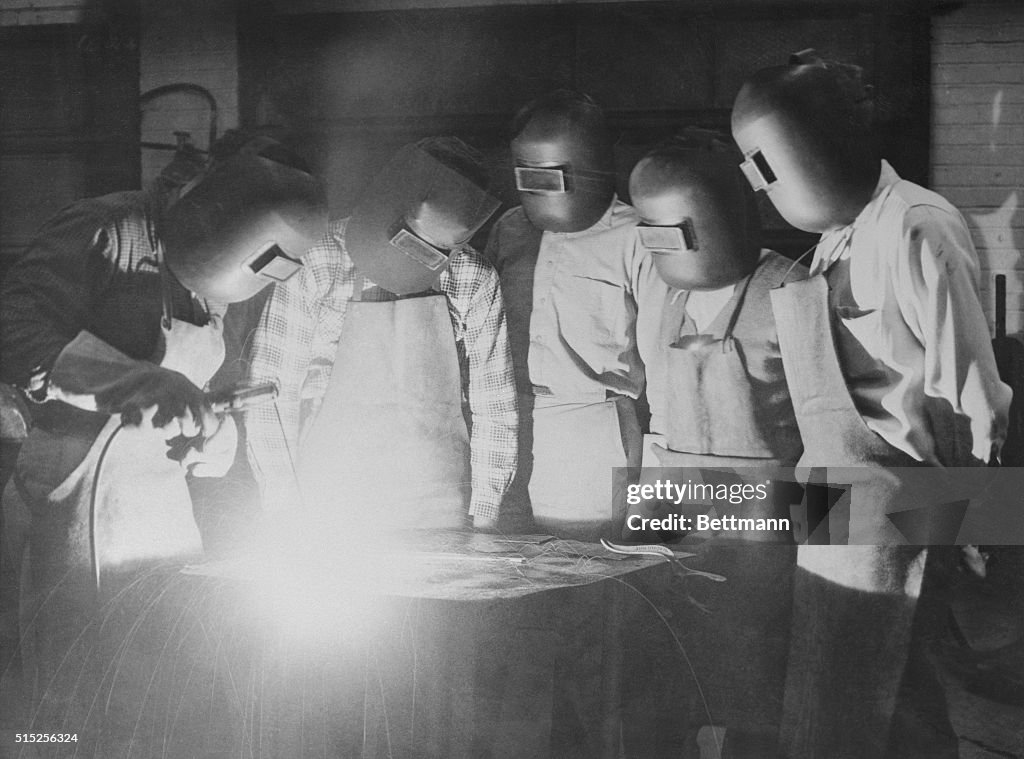 Students in Coveralls