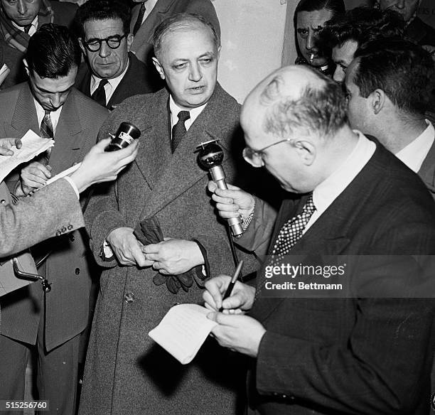 French Socialist tries to form new cabinet...French Socialist leader Christian Pineau, shown talking to newsmen, is trying to break the deadlock in...