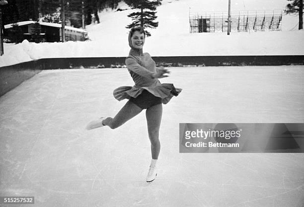 World Figure Skating Champion Carol Heiss, New York City, goes through her paces in the Squaw Valley practice rink for the first time late 2/2. Carol...