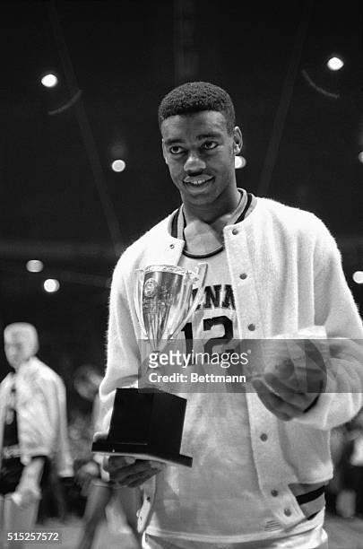 Oscar Robertson is shown winning the MVP award at the Holiday Festival in Madison Square Garden.