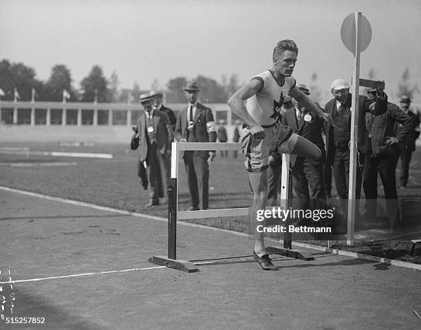 Earl Thomson of Canada is shown clearing one of the hurdles in the final of the 110 meter hurdle events at the Olympic Games in Antwerp. Thomson won...