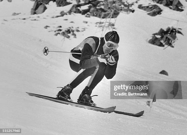 Jean Vaurnet, of France, storms down the slopes of Squaw Peak here Feb. 22nd to win the men's downhill event of the VIII Winter Olympic Games with a...