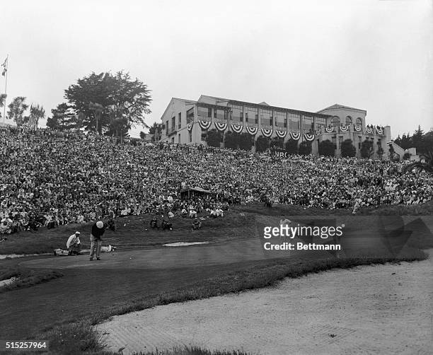 Ben Hogan putts toward the 18th hole in the final scheduled round of the USGA Open Championship as a crowd estimated at 15,000 watches breathlessly...