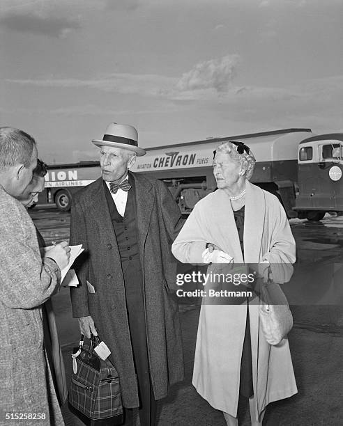 Los Angeles, CA- Mr. And Mrs. Adolph Coors II talk to reporters between planes at Los Angeles International Airport, Coors who was once an intended...