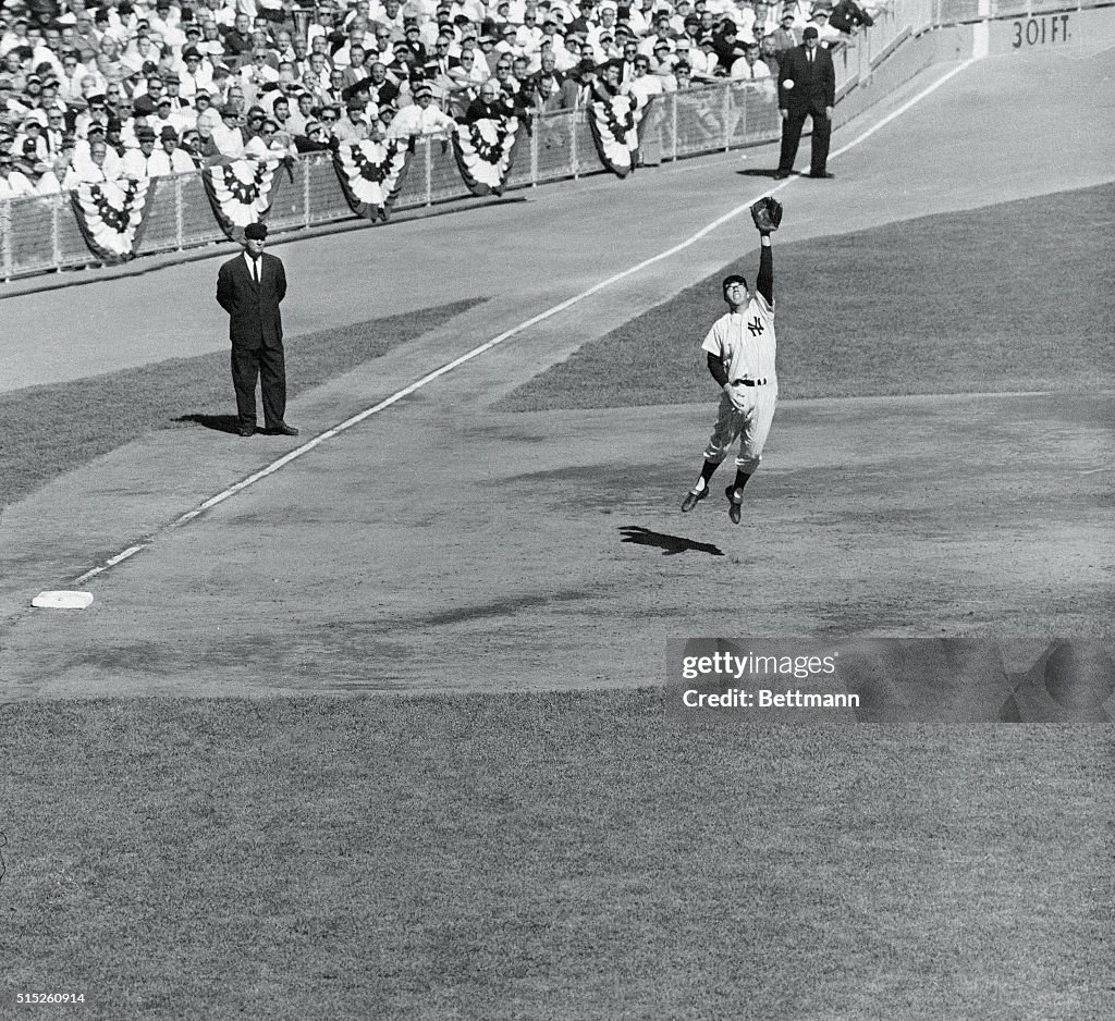 Gil McDougald Leaping for Catch