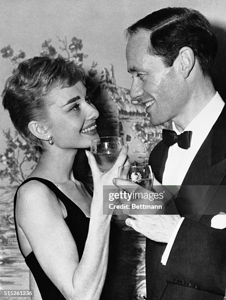 Audrey Hepburn, 25 year old Academy Award winning actress, and actor Mel Ferrer, who costarred with her in the Broadway play Ondine were married in a...