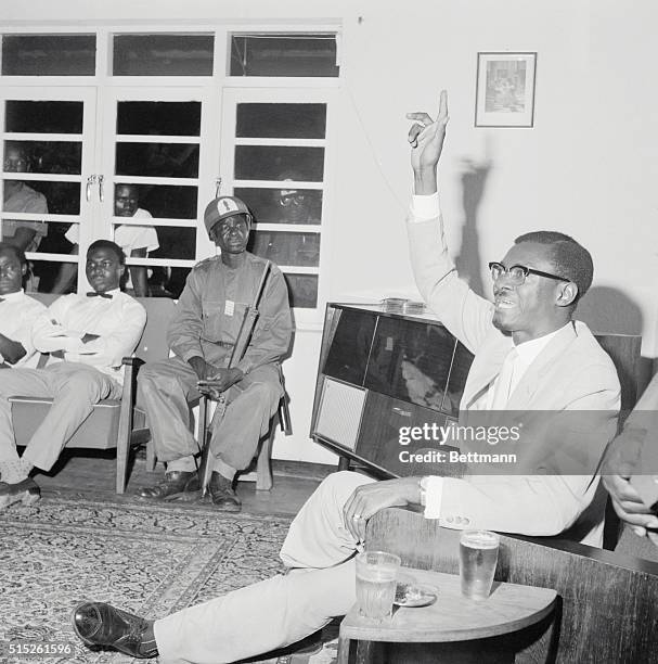 Leopoldville, Congo: Press Conference at Leopoldville. Deposed Premier Patrice Lumumba held an improvised press conference under the guard of the...