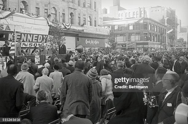 Sen. John F. Kennedy, Democratic presidential nominee, speaks at a rally in front of the hotel Theresa in Harlem. Kennedy made a half dozen speeches...