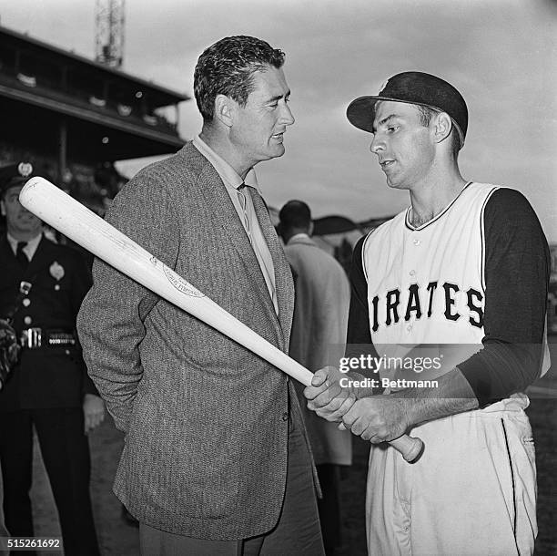Pirate Dick Groat listens as former Red Sox star Ted Williams gives him some pointers, just before game number two of the 1960 World Series got under...