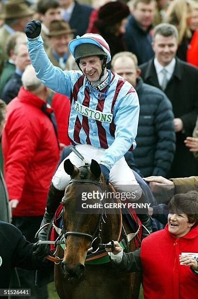 Best Mate jumps the last with Jim Culloty celebrate after winning the Cheltenham Gold Cup 14 March 2002, at the Cheltenham Festival. It was a first...