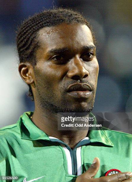Portrait of Nigerian national soccer team midfielder Augustin "Jay-Jay" Okocha, taken 26 March 2002 at Loftus Road stadium in London before the start...