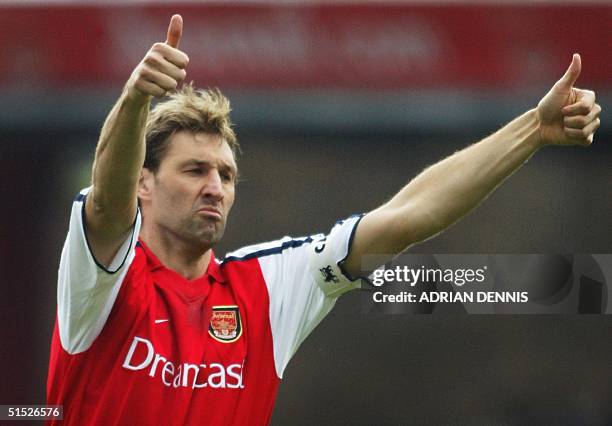 Arsenal's Captain Tony Adams salutes the crowd during the game against Sunderland in the Premier League match at Highbury in London 30 March 2002....