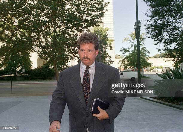 Trucker Reginald Denny arrives at the Federal Building 27 September 1993 in Los Angeles, California. A judge indicated he will dismiss Denny's 40...