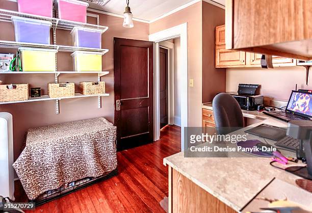 Home office created in house built in 1927. Renovated bedroom uses wire shelves and small file tote containers instead of file cabinets. Layout...