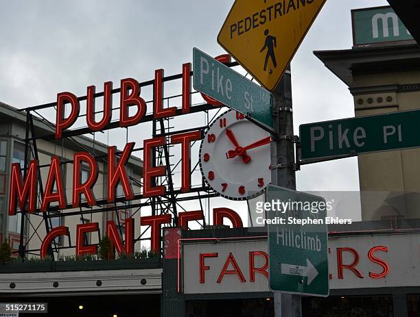 Pike Place Market Signs cluster at the main market entrance