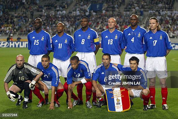 The French national soccer team players pose prior to the start of their first game against Senegal in the 2002 FIFA World Cup Korea/Japan opening...