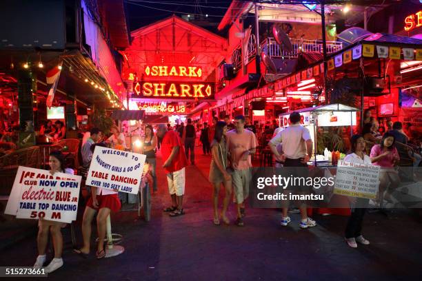 red light viertel pattaya - go go dancer stock-fotos und bilder