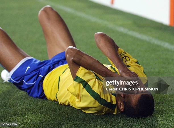 Brazil's Rivaldo reacts after a foul, 03 June 2002 in Ulsan's Munsu Football Stadium, during a Group C match between Turkey and Brazil in the 2002...