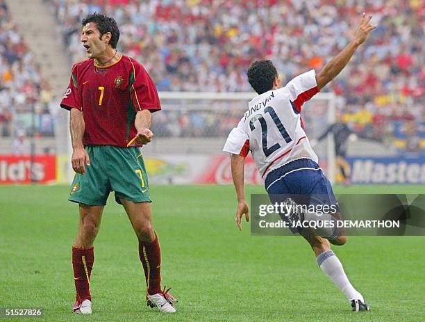 Forward Landon Donovan celebrates after scoring his team's second goal against Portugal in their Group D match at the 2002 FIFA World Cup Korea/Japan...