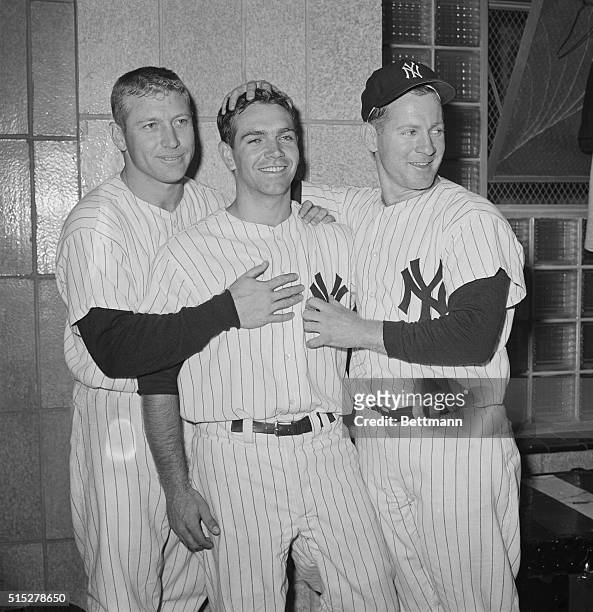 Yankees Mickey Mantle , and Whitey Ford , make Bobby Richardson the center of attention here in the dressing room. Richardson knocked in six RBIs to...