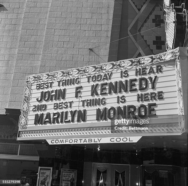 Politics makes strange marquee-fellows out of Democratic Presidential nominee Senator John F. Kennedy and Marilyn Monroe in Spokane, Washington. The...