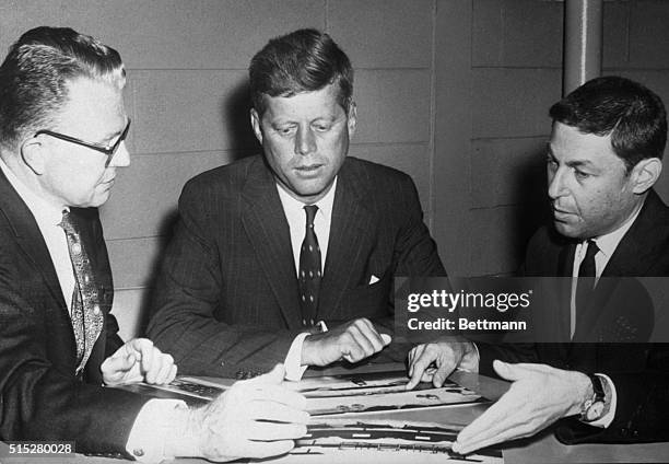 News producer-director Don Hewitt briefs Senator John F. Kennedy and J. Leonard Reinsch, Kennedy's communications advisor, on plans for the first...