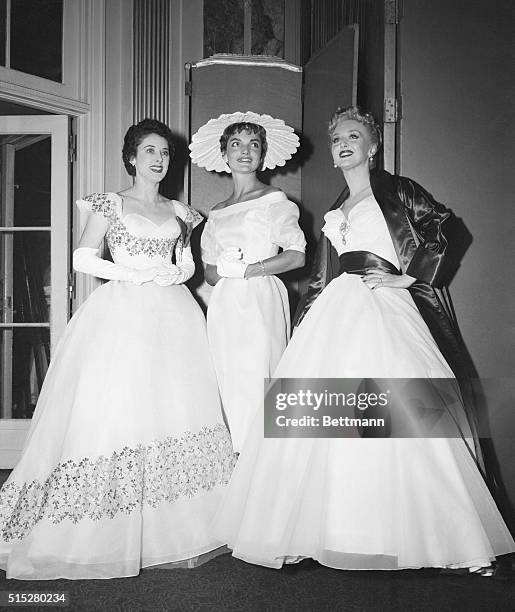 New York: Attend April In Paris Ball...Sloan Simpson, , Mrs. John F. Kennedy, , wife of the U.S. Senator from Massachusetts, and stage star Celeste...