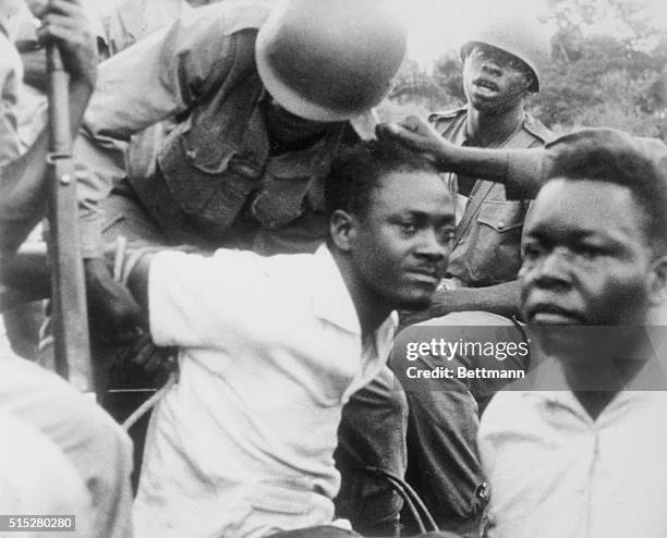 They've Got Him. Leopoldville, Congo: His arms roped behind him, ousted Congo Premier Patrice Lumumba is roughly handled by soldiers here. Lumumba,...