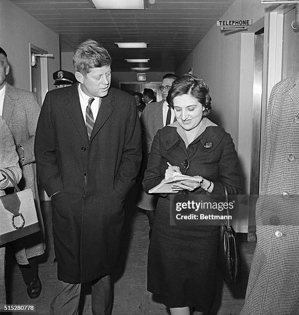 Washington, DC: UPI reporter Helen Thomas interviews President-elect John Kennedy at Georgetown University Hospital, during Kennedy's visit to his...