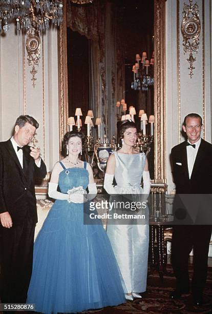 President John F. Kennedy and First Lady Jackie Kennedy pay a visit to the royal family in England. : John F. Kennedy; Queen Elizabeth II; Jackie...