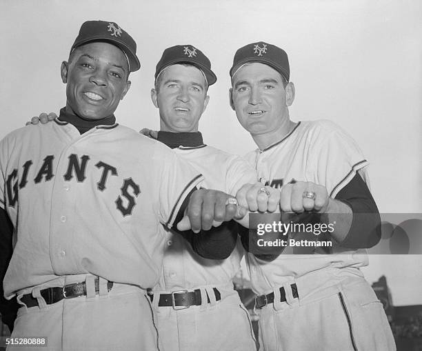 Displaying their World Series rings are from left: Giant's Willie Mays, Don Mueller and Jim Dusty Rhodes. This trio starred in last year's series...