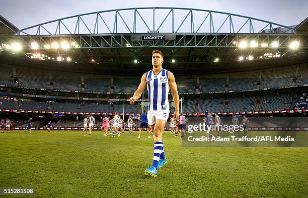 Andrew Swallow of the Kangaroos walks to the coin toss during the 2016 NAB Challenge match between the Hawthorn Hawks and the North Melbourne...