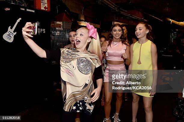 The cast of "Dance Moms" takes a selfie during Nickelodeon's 2016 Kids' Choice Awards at The Forum on March 12, 2016 in Inglewood, California.