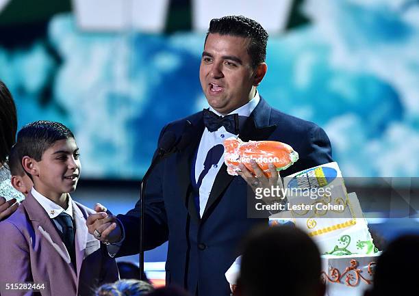 Buddy Valastro Jr. And chef/TV personality Buddy Valastro accepts the Favorite Cooking Show award for 'Cake Boss' onstage during Nickelodeon's 2016...