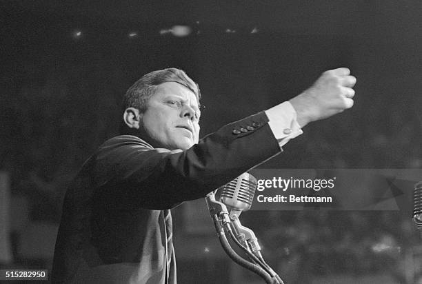 Democratic presidential nominee, Senator John F. Kennedy, clenches his fist to make a point at a Democratic wind-up rally.
