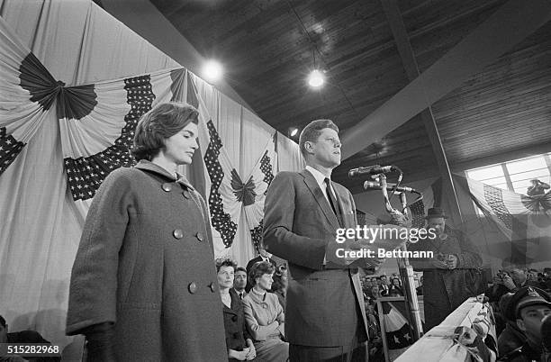 Floodlight casts starlight effect above President-elect John F. Kennedy, as he gives acceptance speech at press headquarters, Hyannis National Guard...