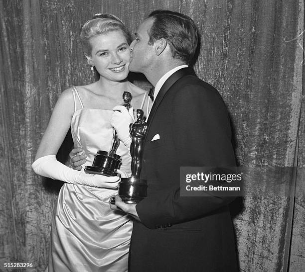 Actress Grace Kelly holding her Oscar after she was honored as the "Best Actress" of 1954 at the 27th Academy Awards. She won the prize for her role...
