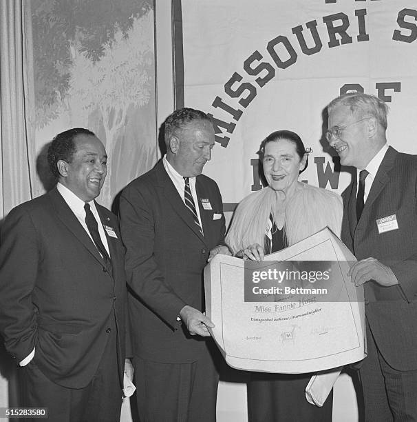 New York, New York: Left to right are Langston Hughes, author; Miller Moore, President of the Missouri Society; Fannie Hurst, author and recipient of...
