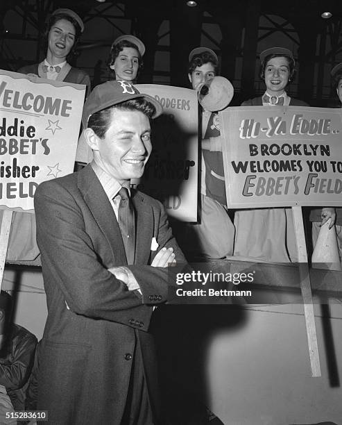 Brooklyn, New York: What's Behind The Wink Eddie??? Crooner Eddie Fisher gave members of the Brooklyn Dodger coed club a big wink tonight after they...