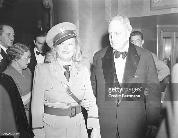 California: William Randolph Hearst with Marion Davies are shown leaving the California State guard Military Ball held at the Palladium, Hollywood,...