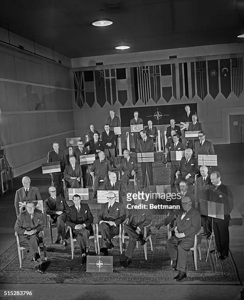 Paris, France: Members of the ministerial council of the North Atlantic Treaty Organization, including the newest member, West German chancellor...