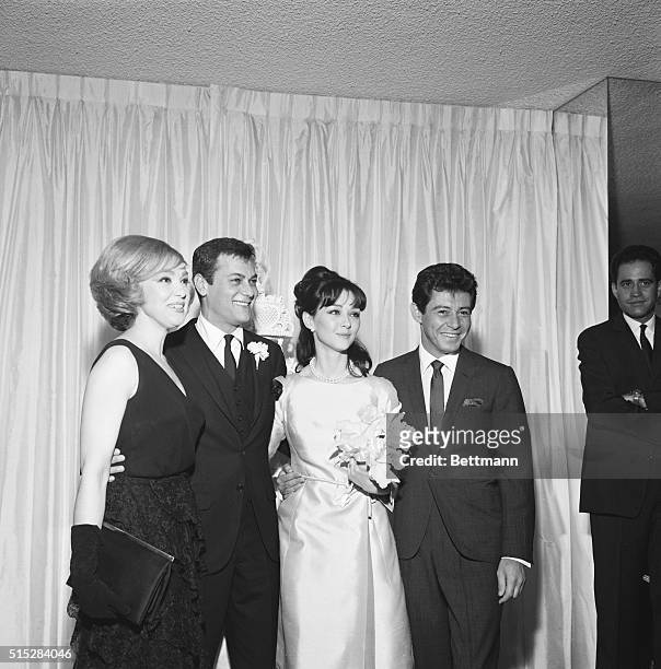 Las Vegas, NV.: Wedding of Tony Curtis and Christine Kaufmann; Edie Adams, , and Eddie Fisher , stand on either side of the couple.
