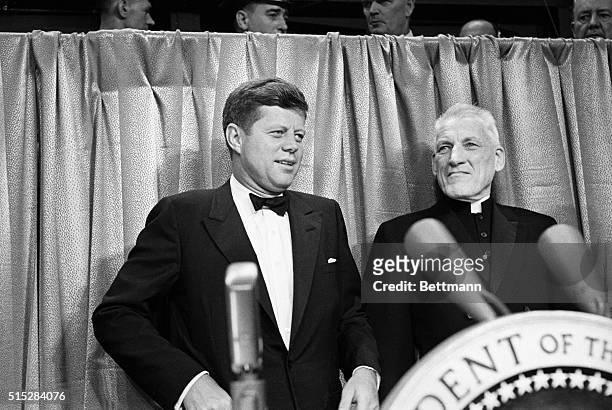 President John F.Kennedy poses with Cardinal Cushing at Boston's Commonwealth Armory where he celebrated his 44th birthday at a gala birthday party.