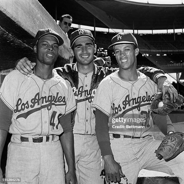 Third-place Los Angeles kept up pressure in the National League by blanking the Chicago Cubs, 3-nothing here 6/20. Sandy Koufax pitched a brilliant...