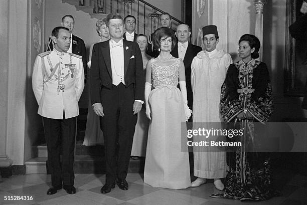 President and Mrs. Kennedy were hosts tonight at State dinner in honor of King Hassan II of Morocco at the White House. Shown prior to the dinner,...